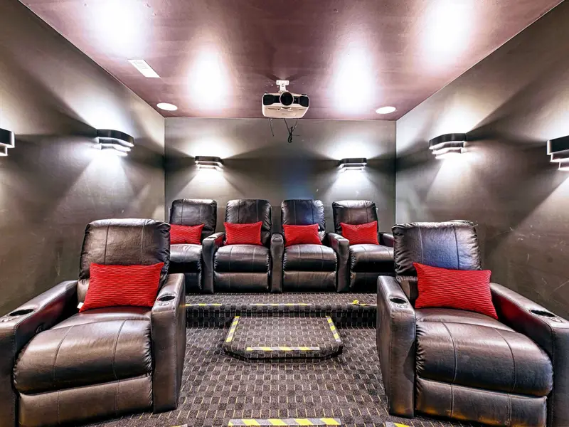 Private Theater: Tiered leather recliners, full projector & Roku, gaming-ready setup, soft lighting, and snacks nearby. Perfect for movie marathons, rom-com nights, or late-night popcorn—lakefront style magic!