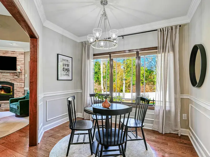 Tucked just off the kitchen and peeking into the Green Room, this cozy breakfast nook
is the keeper of early hours and soft starts.