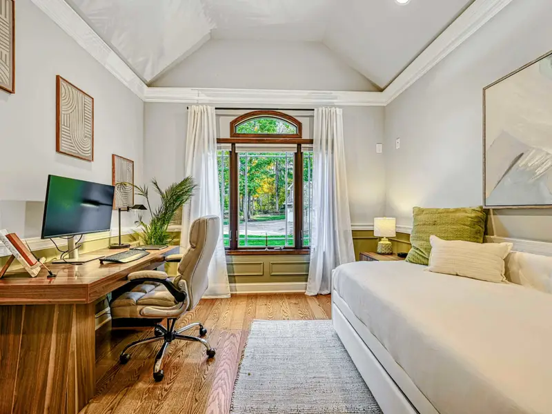 This versatile office/den features a fully equipped workstation with monitor and docking station, plus a full daybed with twin trundle—perfect for remote work by day and a quiet, comfortable guest room by night.