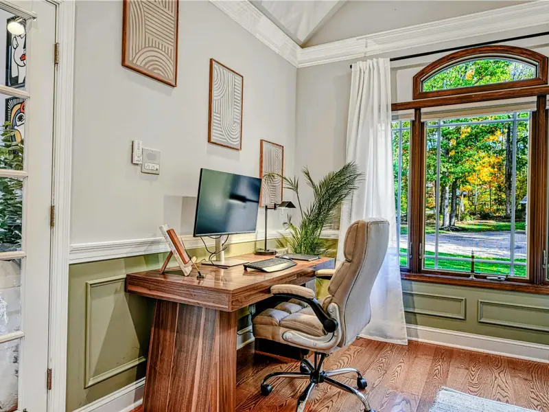 This versatile office/den features a fully equipped workstation with monitor and docking station, plus a full daybed with twin trundle—perfect for remote work by day and a quiet, comfortable guest room by night.