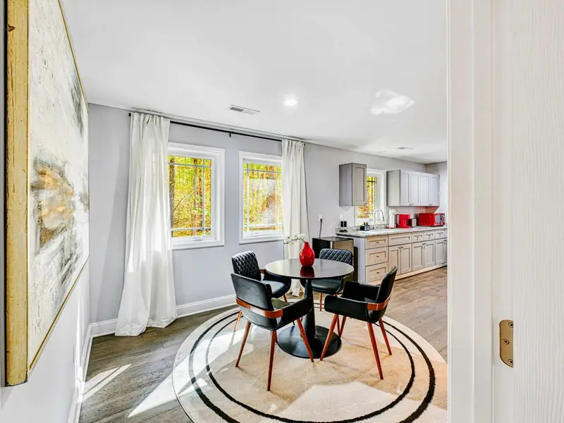 Guest Apartment: Above the 3-car carriage house, this fully finished space offers extra bedrooms for teens, grandparents, or friends who want privacy and comfort—perfect for flexible group stays.