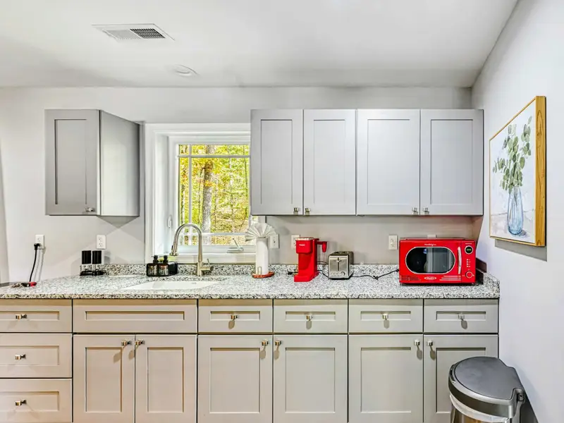 Guest Apartment: Above the 3-car carriage house, this fully finished space offers extra bedrooms for teens, grandparents, or friends who want privacy and comfort—perfect for flexible group stays.