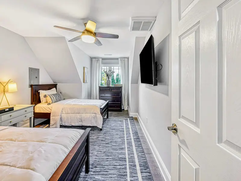 Guest Apartment: Above the 3-car carriage house, this fully finished space offers extra bedrooms for teens, grandparents, or friends who want privacy and comfort—perfect for flexible group stays.