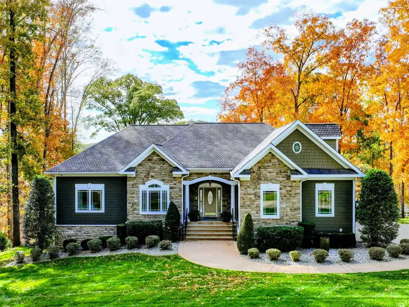 Direct lake access from your backyard: wide-water views, private dock and peaceful
cove perfect for swimming, paddleboarding, and sunset cruising.