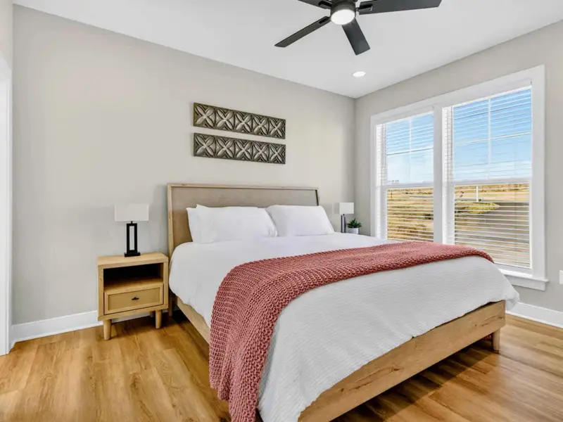 Simple, Restful Sleep – A calm king bedroom designed for deep rest after full lake days.