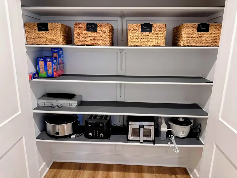 Everything in Its Place – A tidy pantry that keeps group meals easy and mornings running smoothly.