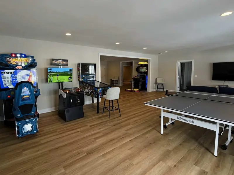 The Fun Floor – A spacious game room where everyone finds their favorite way to unwind together.