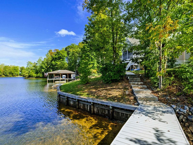 Waterfront Path - Stone steps and a landscaped walkway lead from the shoreline up to the home.