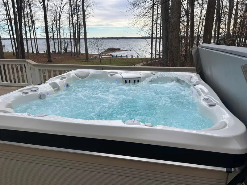 Enjoy a soak in the hot tub with lake views.