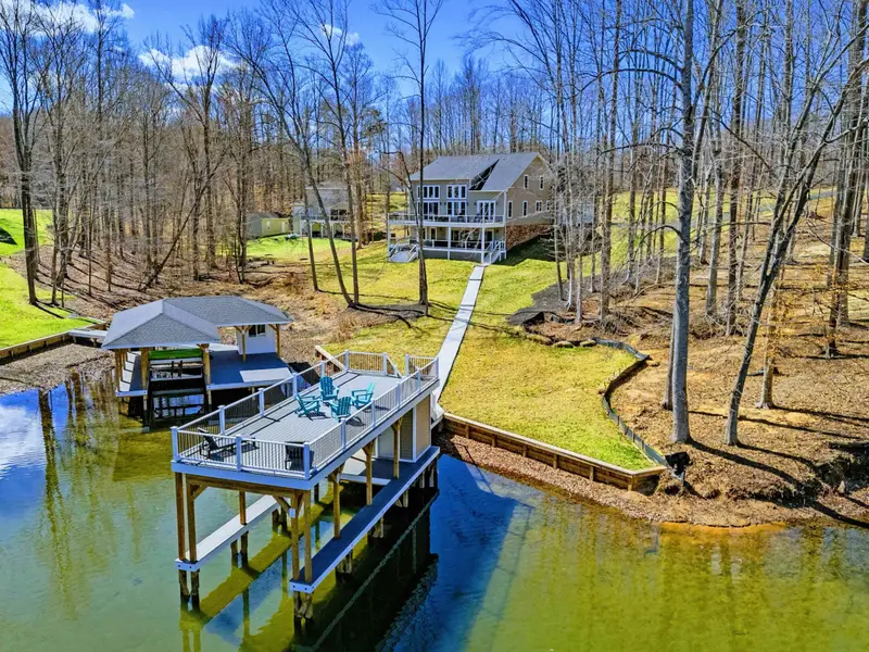 Lakeside Living - Where the backyard meets the water and every evening ends around the fire pit.