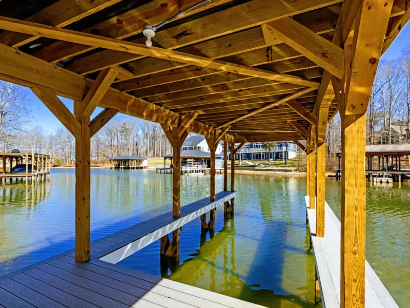 Shoreline Setting - Step off the lawn and onto the dock for morning coffee or sunset fishing.