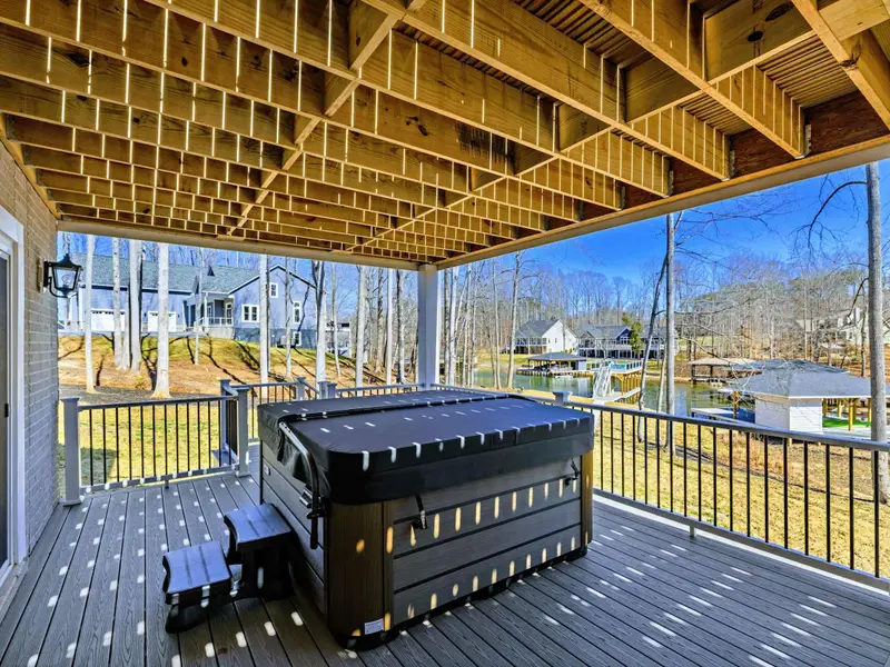 Hot Tub Under Cover - The hot tub sits under the covered deck, ready for a soak any time of day.