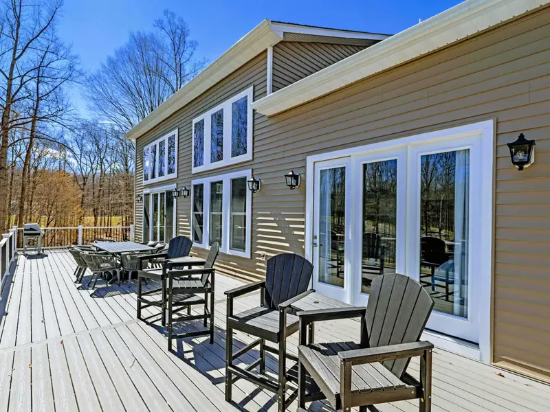 Open Deck - The wraparound deck offers seating from every angle, wide open to the water.