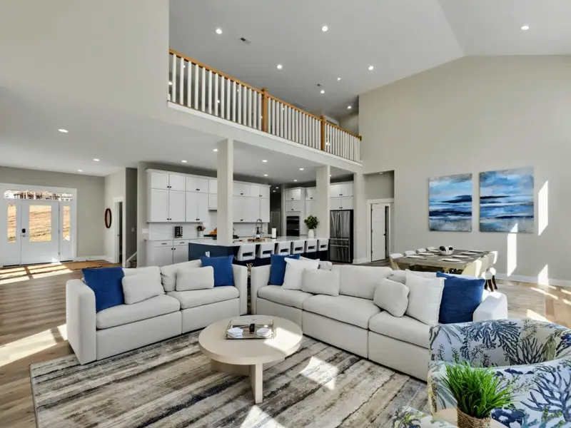 Living Space - Vaulted ceilings, lake views, and enough room for the whole group to settle in.