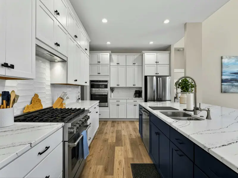 Gourmet Prep - Premium appliances and generous counter space for cooking that becomes part of the memory.