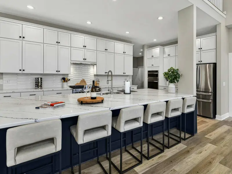 Open Kitchen - The layout keeps the cook connected to the conversation and the view.