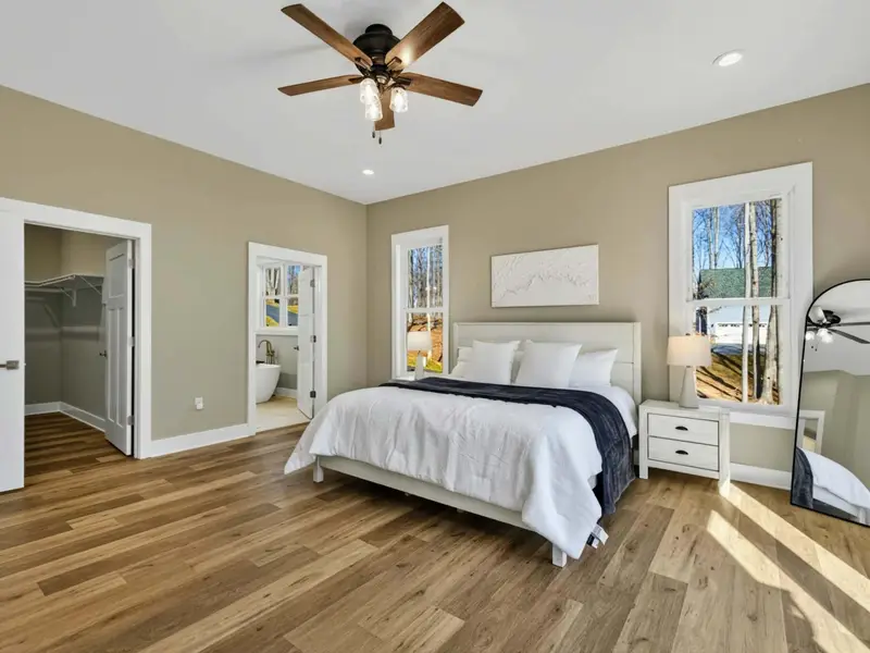 Lakefront Rest - The primary suite sits lakeside, so the water is the first thing you see each morning.