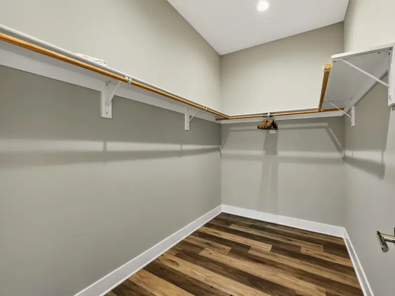 Walk-In Closet - Generous closet space in the primary suite keeps luggage off the floor and everything in reach.