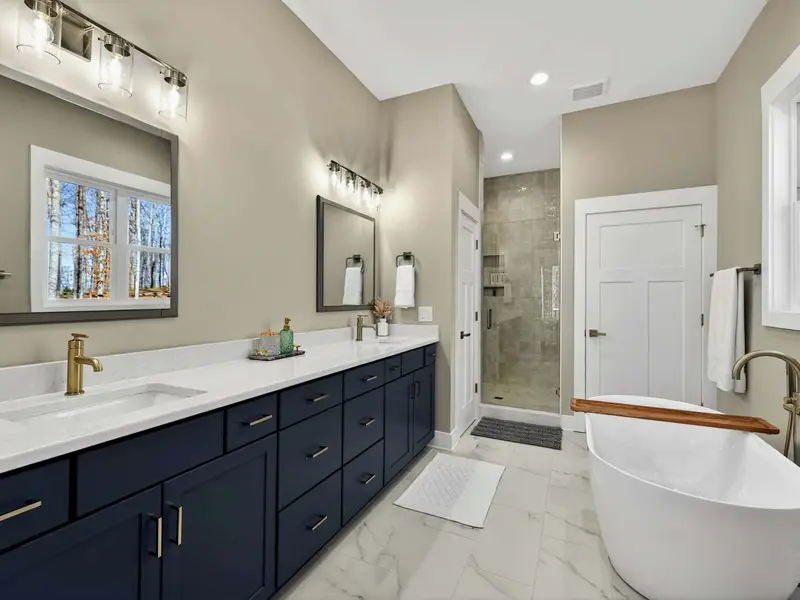 Vanity Detail - Dual vanities, quality fixtures, and a clean, calming design throughout.