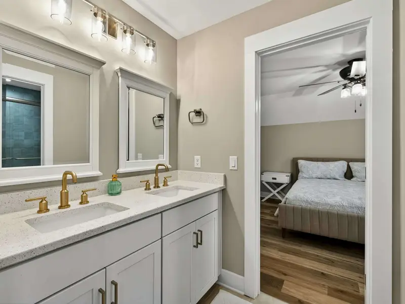 Shared Bath Access - Upper bedrooms share a well-appointed full bath just steps down the hall.