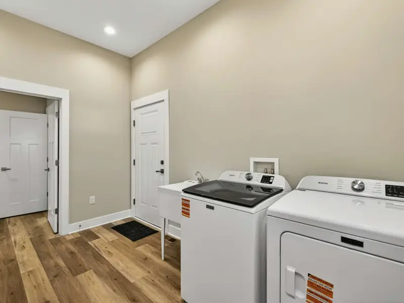 Lower Level Laundry - A second washer and dryer on the lower level keeps laundry convenient for the whole house.