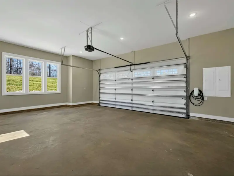 Two-Car Garage - A spacious two-car garage with room to park and unload for easy arrival and departure.