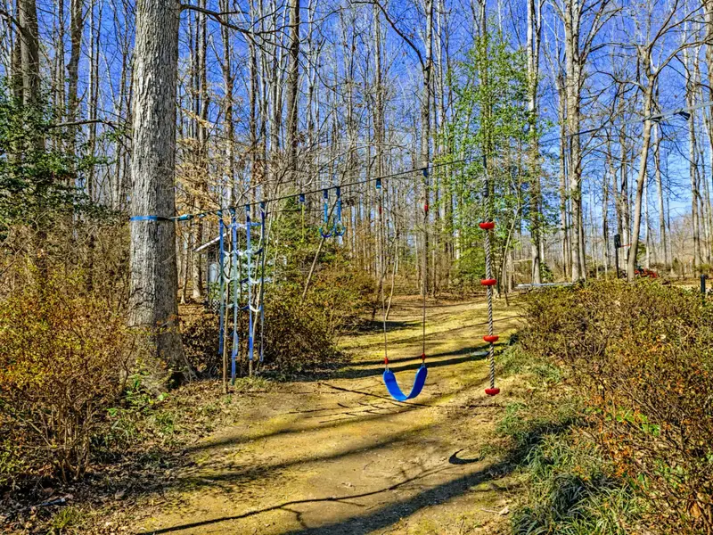 Ninja Course - A wooded obstacle course with balance beams and colorful elements gives kids (and kids at heart) an outdoor adventure right on the property.