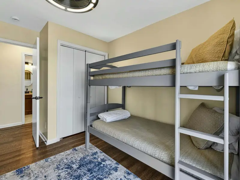 Bunk Room - From the doorway, the layout shows easy access to the closet and shared bath.