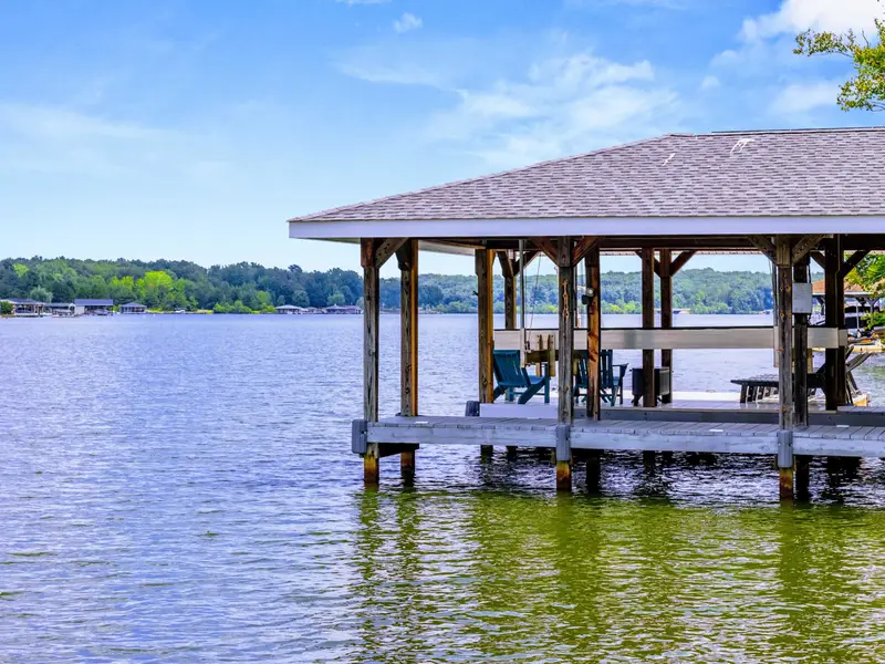 Comfortable seating and a ceiling fan on the dock. This becomes the living room by mid-afternoon.