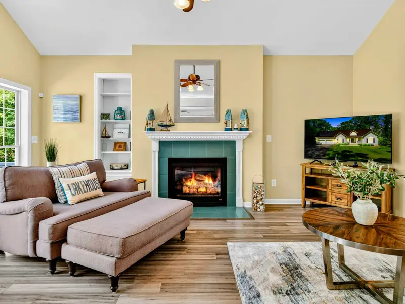 Sink into the sofa by the fire. Whether the evening calls for conversation, a board game, or a movie, this is the spot.