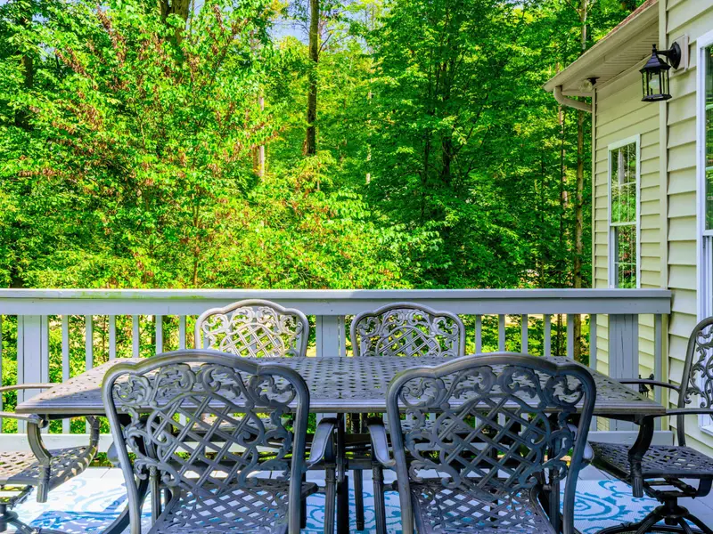 Covered upper deck with dining for six and a ceiling fan. Dinner with a view, every night.