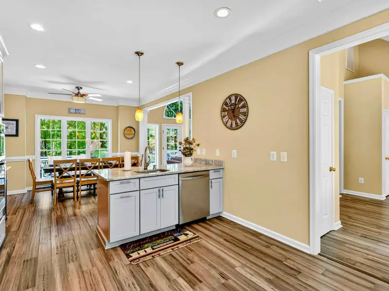 Granite countertops, stainless appliances, and plenty of room to prep. The kitchen handles a crowd without breaking a sweat.