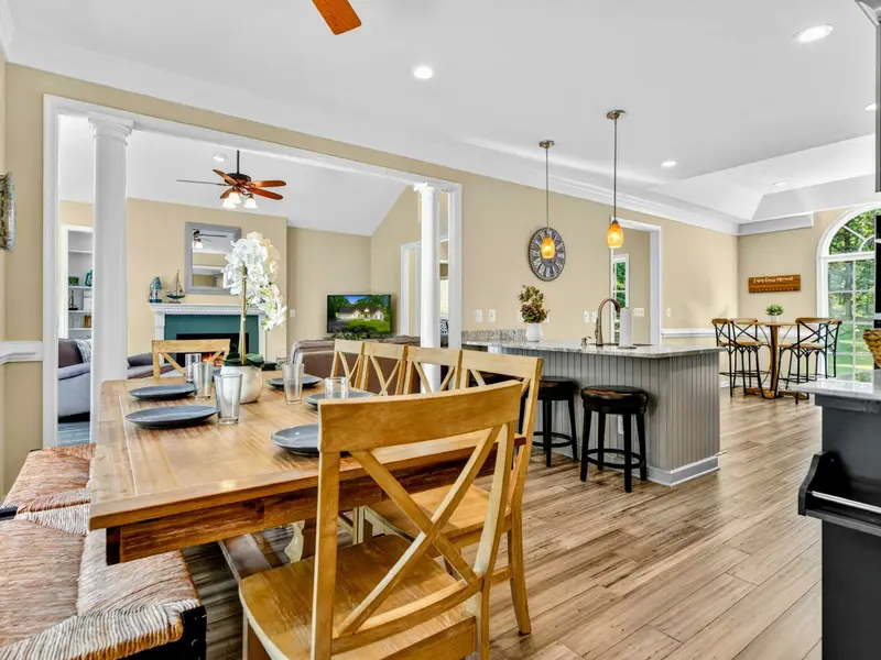 The open floor plan ties the kitchen, dining, and great room together. Everyone stays connected.
