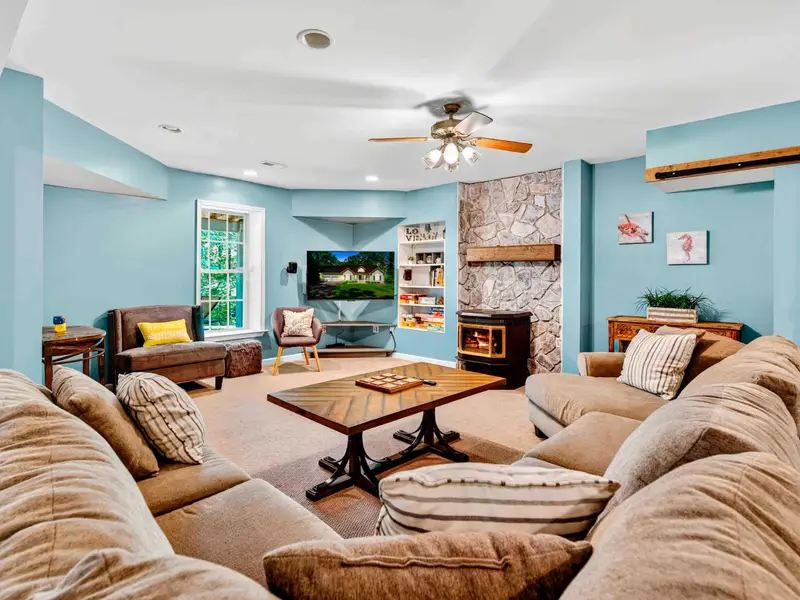 A large sectional facing the TV. This is where the group reconvenes after dinner for movies, games, or just being together.