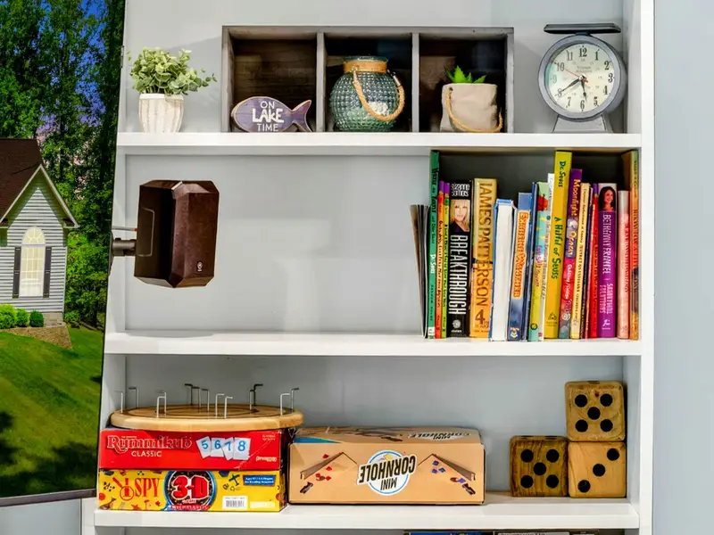 Built-in bookshelves and a reading nook. For the guest who wants a quiet corner while the rest of the house plays.