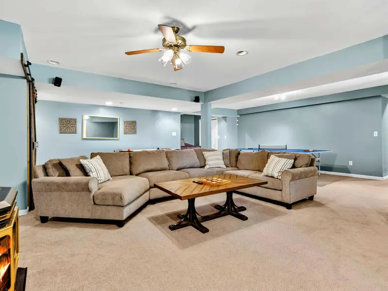 The game room from above: multiple zones for games, lounging, and hanging out. It never feels overcrowded.
