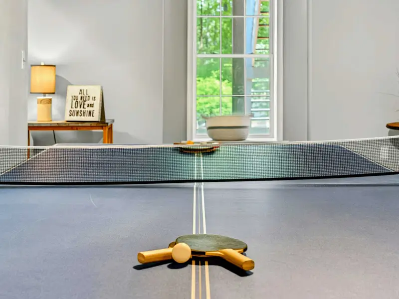 Ping pong front and center. Competitive guests, this is your room.