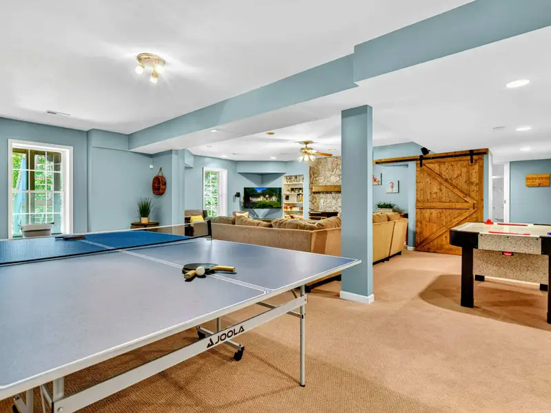 Foosball and ping pong in the open rec room. The game room stays lively from check-in to checkout.