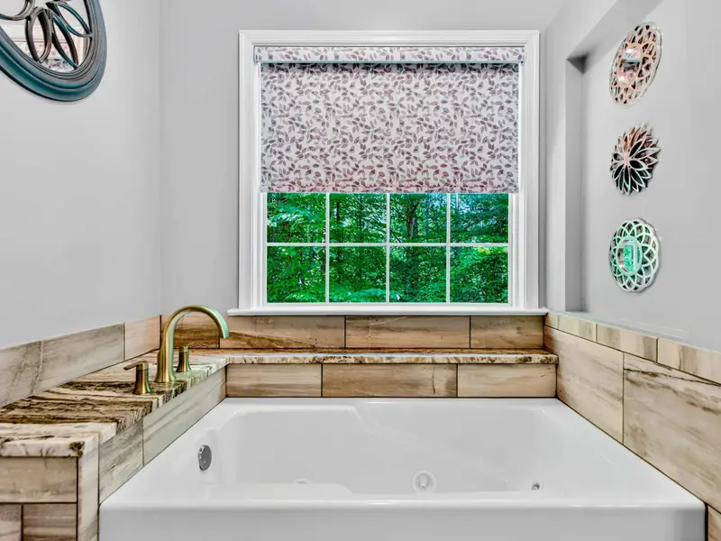 Soaking tub in the primary en-suite. Fill it up, close the door, and let the rest of the house fend for itself.