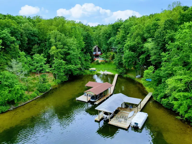 Tucked Away, Easy to Love - Private, wooded, and beautifully designed, this is the retreat you've been looking for.