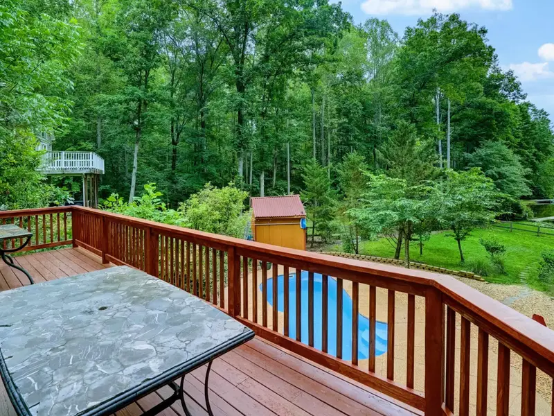 Al Fresco Everything - The deck table is set for morning coffee, relaxed dinners, and everything in between.