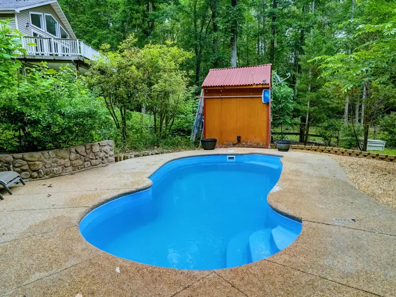 Lap It Up - The pool's clean lines and calm water are an open invitation to slow down and unwind.