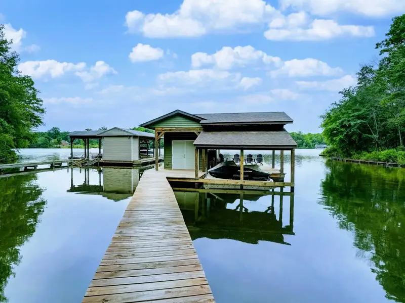 Straight to the Water - Steps from the back door, the dock and lake are always within easy reach.