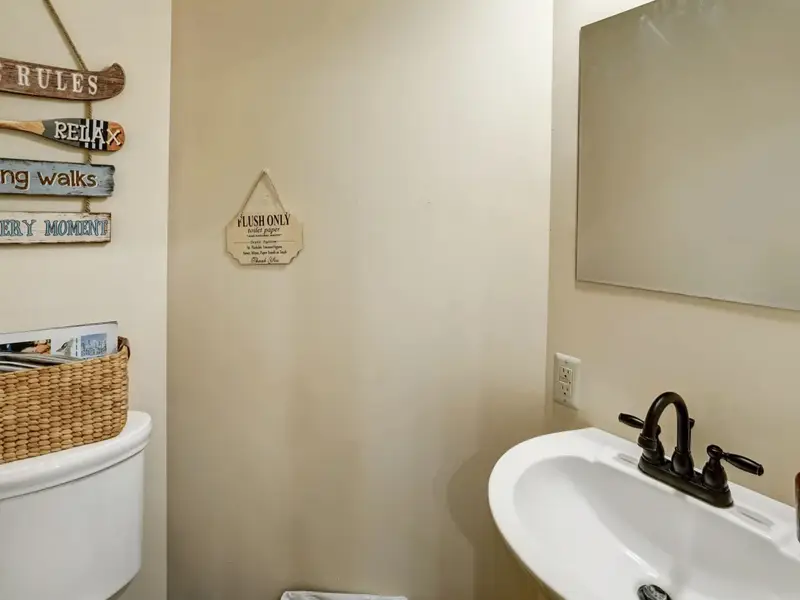 Quick and Convenient - A stylish half bath on the main level keeps the flow of the house effortless for everyone.