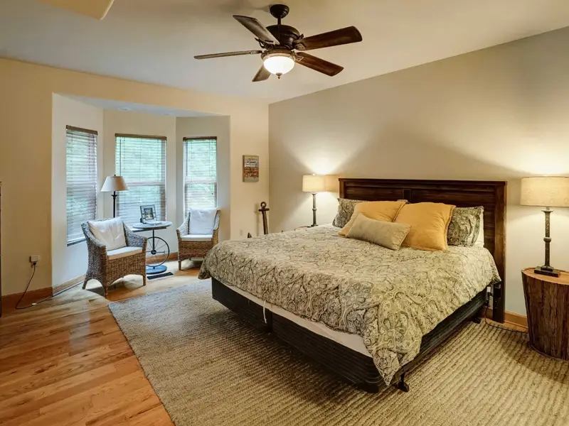The Primary Retreat - A serene, well-appointed main-level suite designed for real rest and rejuvenation.