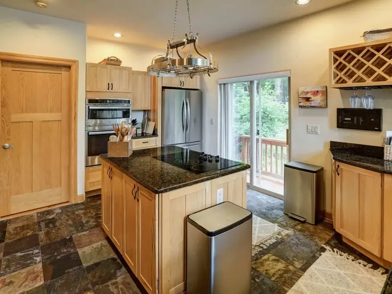 Bright and Inviting - Clean lines, quality appliances, and plenty of prep space make every meal a pleasure.