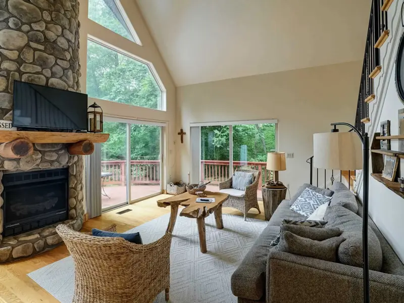 The Heart of the Hideaway - Soaring A-frame ceilings and warm wood tones welcome you the moment you walk in.