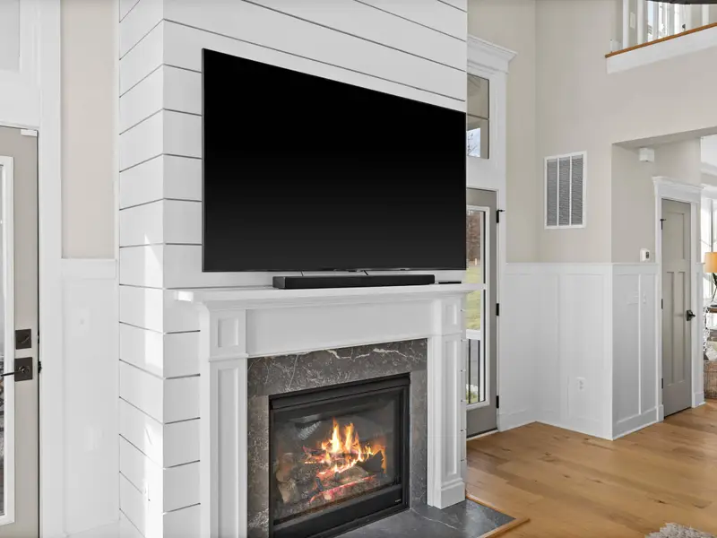 Great Room - Firelight and lake light together, the great room feels made for the end of a day on the water.