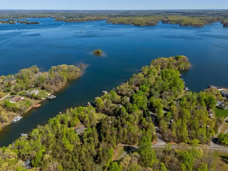 Aerial Arrival: Look at that sprawling yard and private dock, all yours for the week.