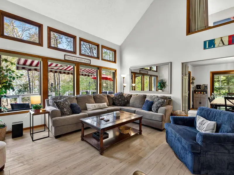 Fireside Lounge: Relax on the plush sectional by the custom herringbone wood accent wall.